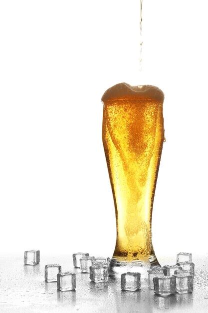 Premium Photo Pouring Beer Into Glass Isolated On White