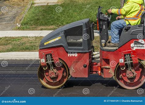 Red Road Roller with Operator Paving a Road Editorial Stock Image - Image of operator, pressure ...