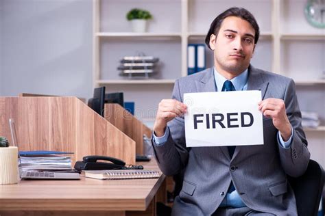 The Young Male Employee Being Fired From His Work Stock Image Image