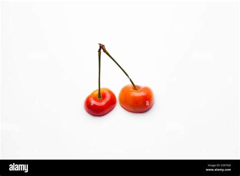 Cherry In The Milk Stock Photo Alamy