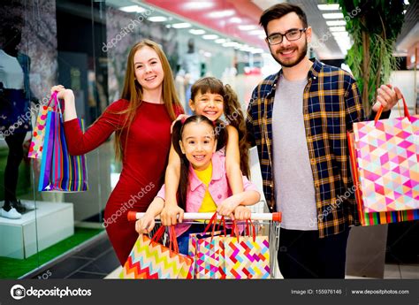 Happy family shopping Stock Photo by ©Lenanichizhenova 155976146