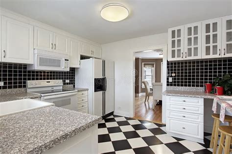 Kitchen With Checkerboard Floor Royalty Free Stock Photo - Image: 15645545