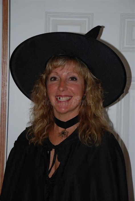 A Pretty Blonde Woman Dressed As A Witch With A Missing Tooth Editorial Stock Image Image Of