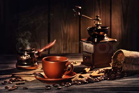 Coffee Still Life With A Cup Coffee Grinder And Grains Stock Image