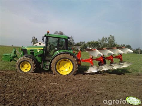 Zdjęcie traktor John Deere 6330 Kuhn 264926 Galeria rolnicza agrofoto