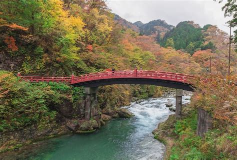 Premium Photo | Shinkyo bridge during autumn in nikko