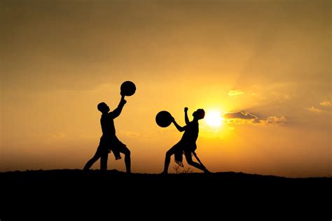 Silhouette of People Performing during Sunset · Free Stock Photo