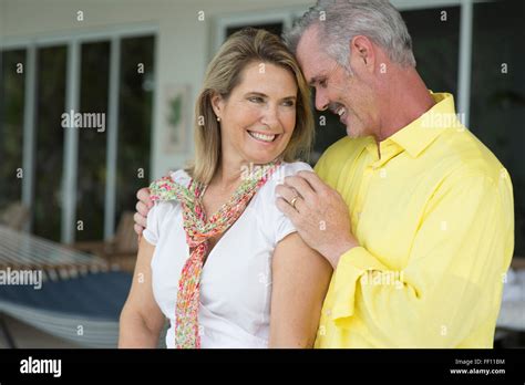 Older Caucasian Couple Hugging Stock Photo Alamy