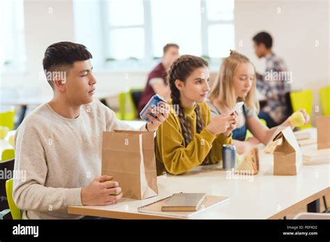 Group Of High School Students At School Cafeteria Together Stock Photo
