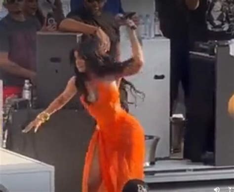 Cardi B Angrily Throws Microphone Into Audience As Fan Tosses Drink At