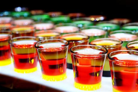 Variation Of Hard Alcoholic Shots Served On Bar Counter Stock Photo