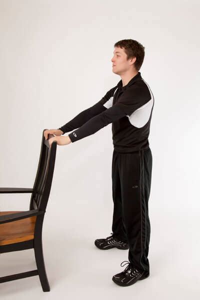 Standing Heel Raises Holding Chair - Live 2 B Healthy - Trainers