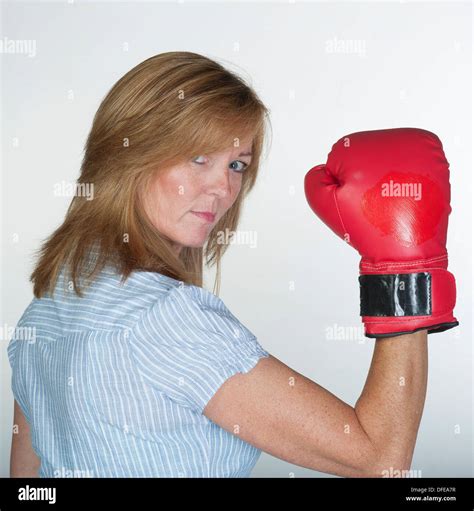 Woman Wearing A Red Boxing Glove In Fighting Mood Stock Photo Alamy