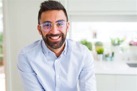 Handsome Business Man Wearing Glasses And Smiling Cheerful With