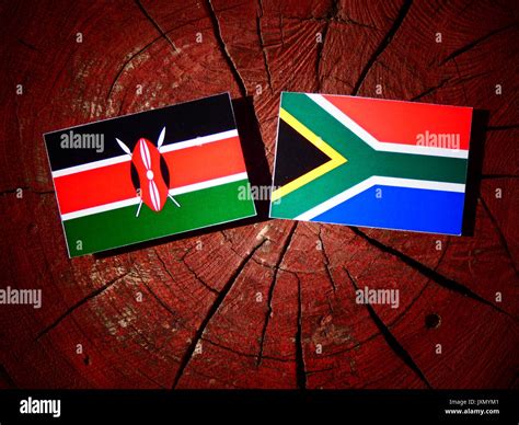 Kenyan flag with South African flag on a tree stump isolated Stock ...