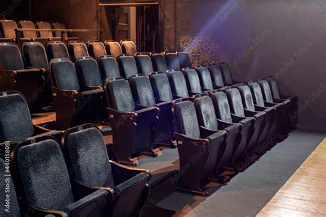 Seats in empty theater Stock Photo | Adobe Stock