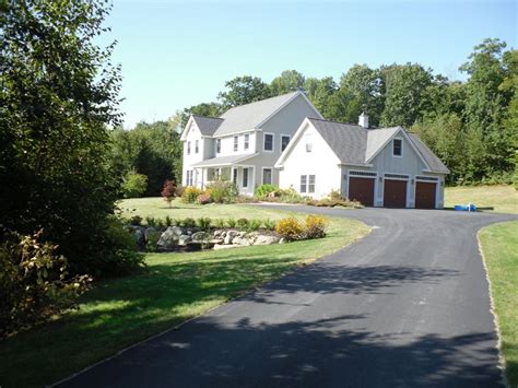 Colonial Style Home With Attached 3 Car Garage And Detached 2 Car