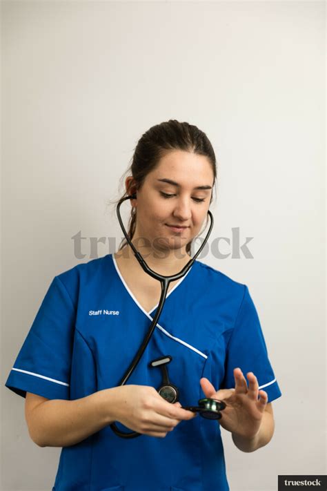 Nurse Wearing A Mask With A Stethoscope By Rod Hill Truestock