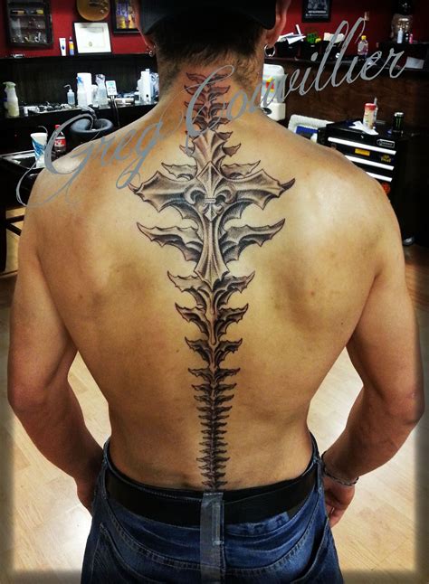 Spine Tattoo By Greg At The Studio Downtown Custom Tattoos And