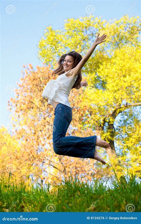 Happy Beautiful Girl Jumping Stock Photo - Image of brunette, lifestyle ...