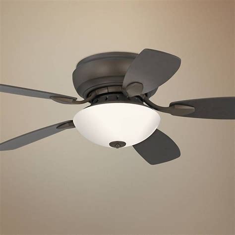 A Ceiling Fan With A Light On It