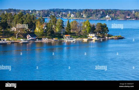 Rural Swedish Landscape Wooden Houses And Barns On Rocky Islands In