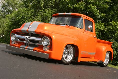 Download Bright Orange Old Ford Truck Wallpaper