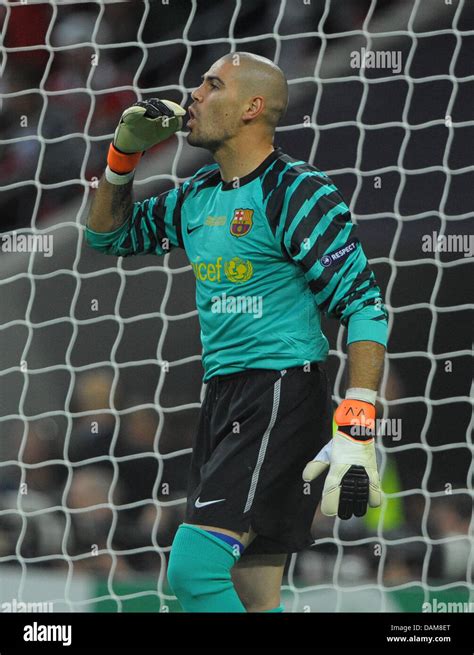 Goalkeeper Victor Valdes Of Barcelona Celebrates During The Uefa