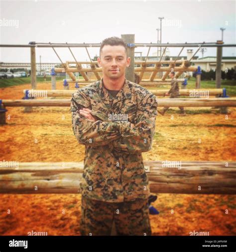 U S Marine Corps Sgt Michael Eckert Poses After Completing The