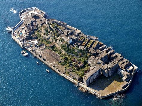 Hashima Island, Japan --- coal mining facility with apartment buildings ...