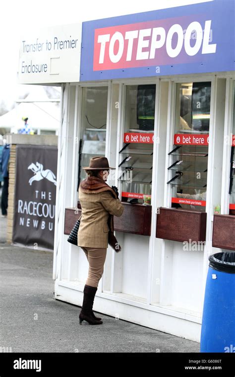 Lady Places Bet The Charity Raceday At Newbury Racecourse Hi Res Stock