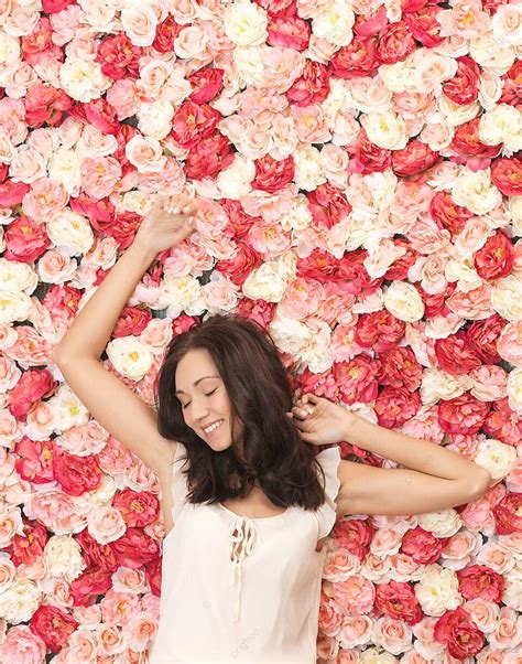 Beautiful Woman And Background Full Of Roses Fresh Brunette Lying Photo