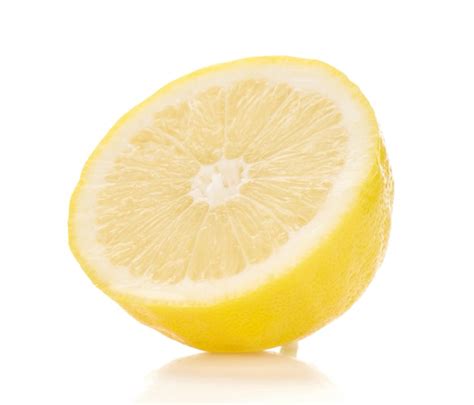 Premium Photo Lime Yellow Sliced On White Background
