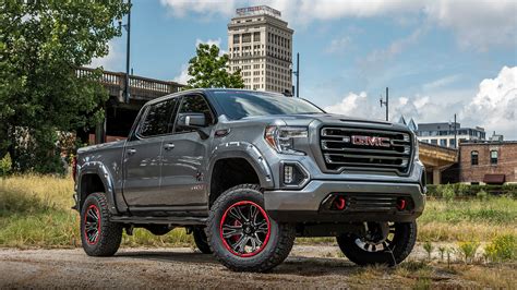 GMC BLACK WIDOW LIFTED TRUCKS — SCA Performance | Black Widow Lifted Trucks