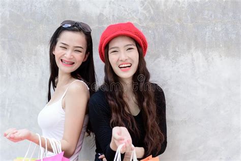 Duo Asian Portrait Girl Has Happy And Smiling With Shopping Colo Stock