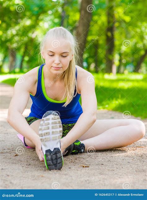 Sporty Girl Stretching Legs before Run Stock Image - Image of caucasian