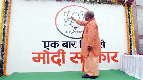 Cm Yogi Kicks Off Wall Writing Campaign With Slogan Ek Baar Phir Modi