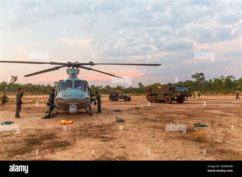 Us Marine Corps Pilots Air Crew And Crash Fire Rescue Personnel Along With A Uh 1y Venom