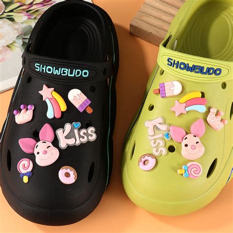 รองเท้า Crocs Jibbitz 14ชิ้นเซ็ตสีชมพูแต่งด้วยหัวเข็มขัดอุดตันที่ถอด