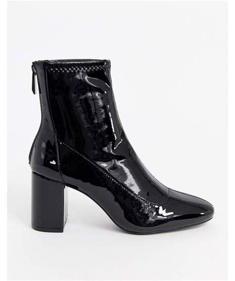 stradivariusストラディバリウスのStradivarius patent heeled boots in blackブーツ