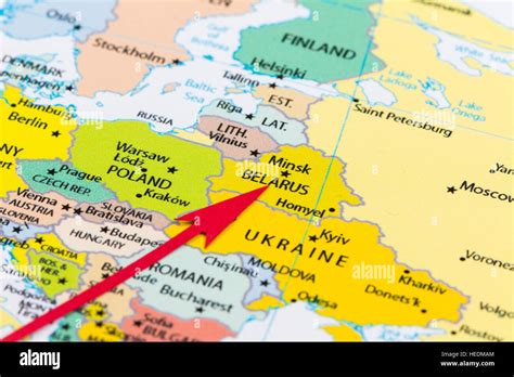 Red Arrow Pointing Belarus On The Map Of Europe Continent Stock Photo