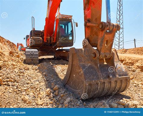 Excavator Scoop During Earthworks On Road Construction Stock Image