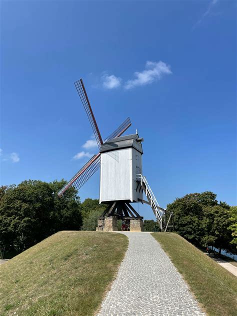 White Windmill Under The Blue Sky · Free Stock Photo