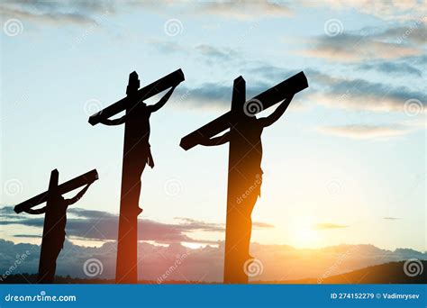 Silhouette Of The Crucified Jesus Christ On The Cross Along With Other