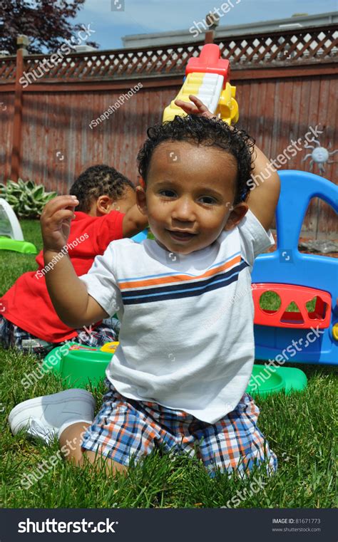 Children Playing Handsome Toddler Kneeling Outside Stock Photo 81671773