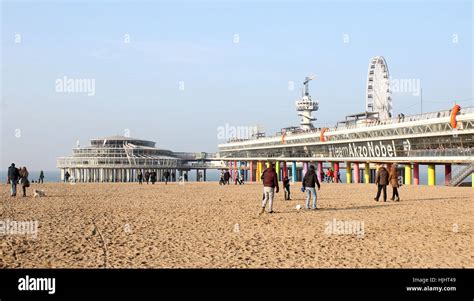 People On The Beach Near Scheveningen Pier At The North Sea Beach