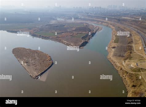 The Clean Jing River Meets The Sandy Wei River In Xian City Northwest