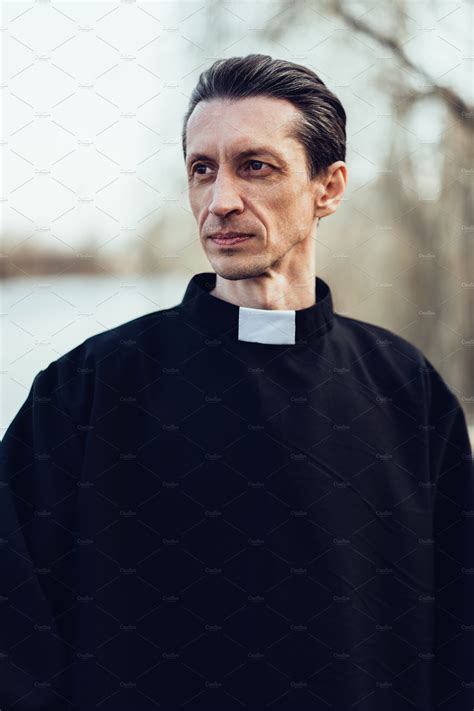 Portrait Of Handsome Catholic Priest Featuring Person Priest And