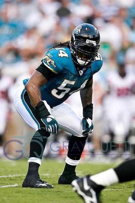 44 uniforms till kickoff #14 - Black helmet/Teal jersey/White pants ...