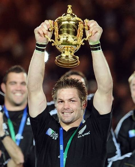 Richie McCaw lifts the Rugby World Cup #5730663 Framed Photos